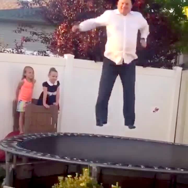 Video thumbnail showing: A man jumps on a trampoline in the yard and then it rips and he falls through.